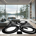 Bold Black White Geometric Swirl Rug