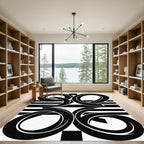Bold Black White Geometric Swirl Rug