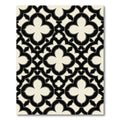 Classic Black and Cream Quatrefoil Grid Rug