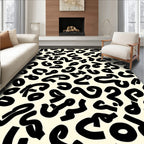 Bold Abstract Black On Cream Pattern Rug